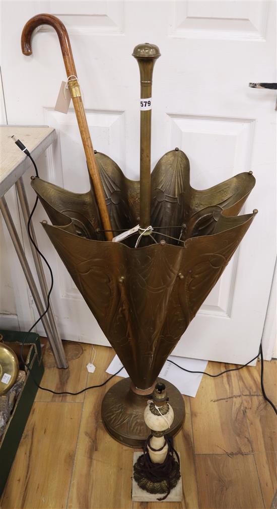 A brass umbrella/stick stand in the form of an umbrella and two other items,